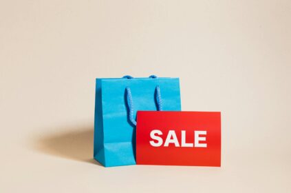 shopping bag and a sale sign
